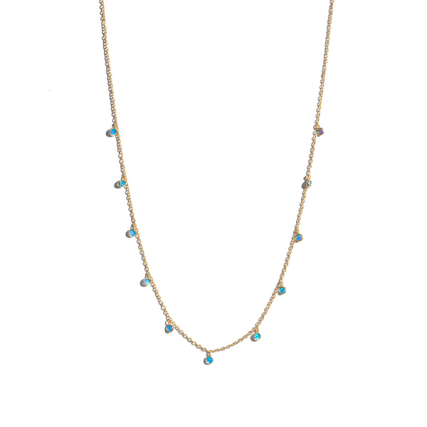 Small Blue Opal Circles on a gold plated silver based chain. Good layering piece