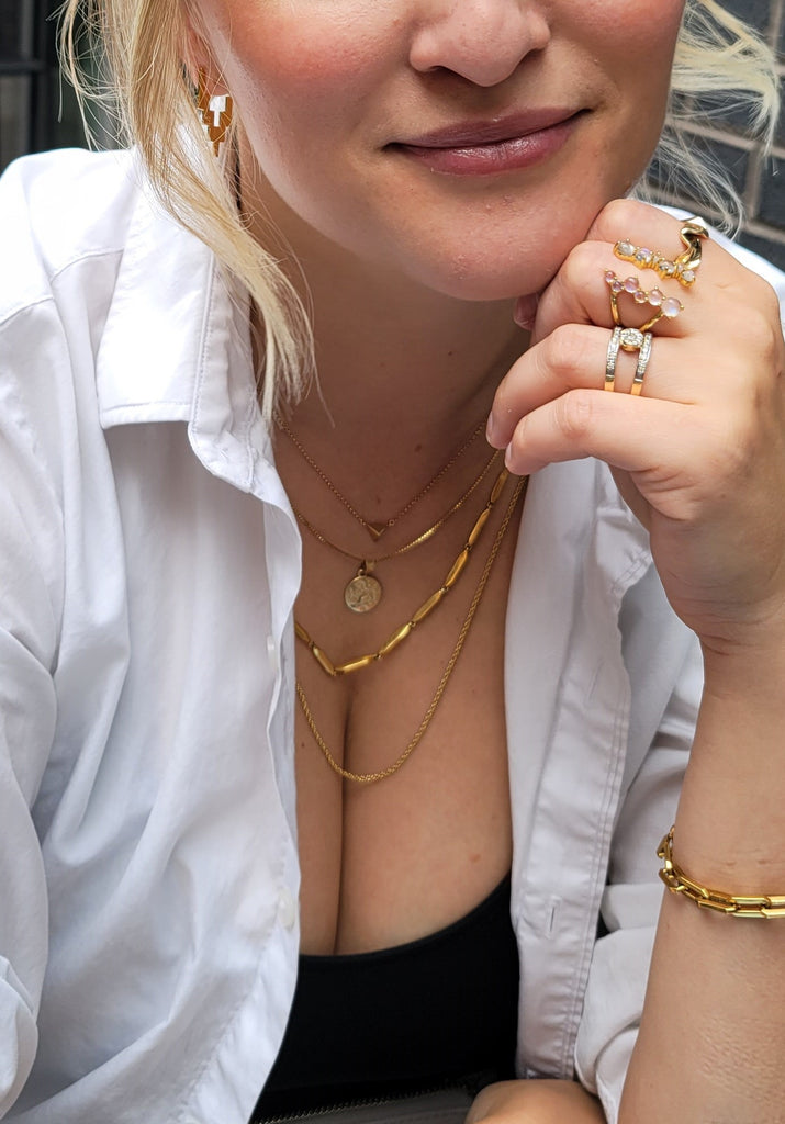 From Chokers to Lariats: Tips for Layering Necklaces with Style