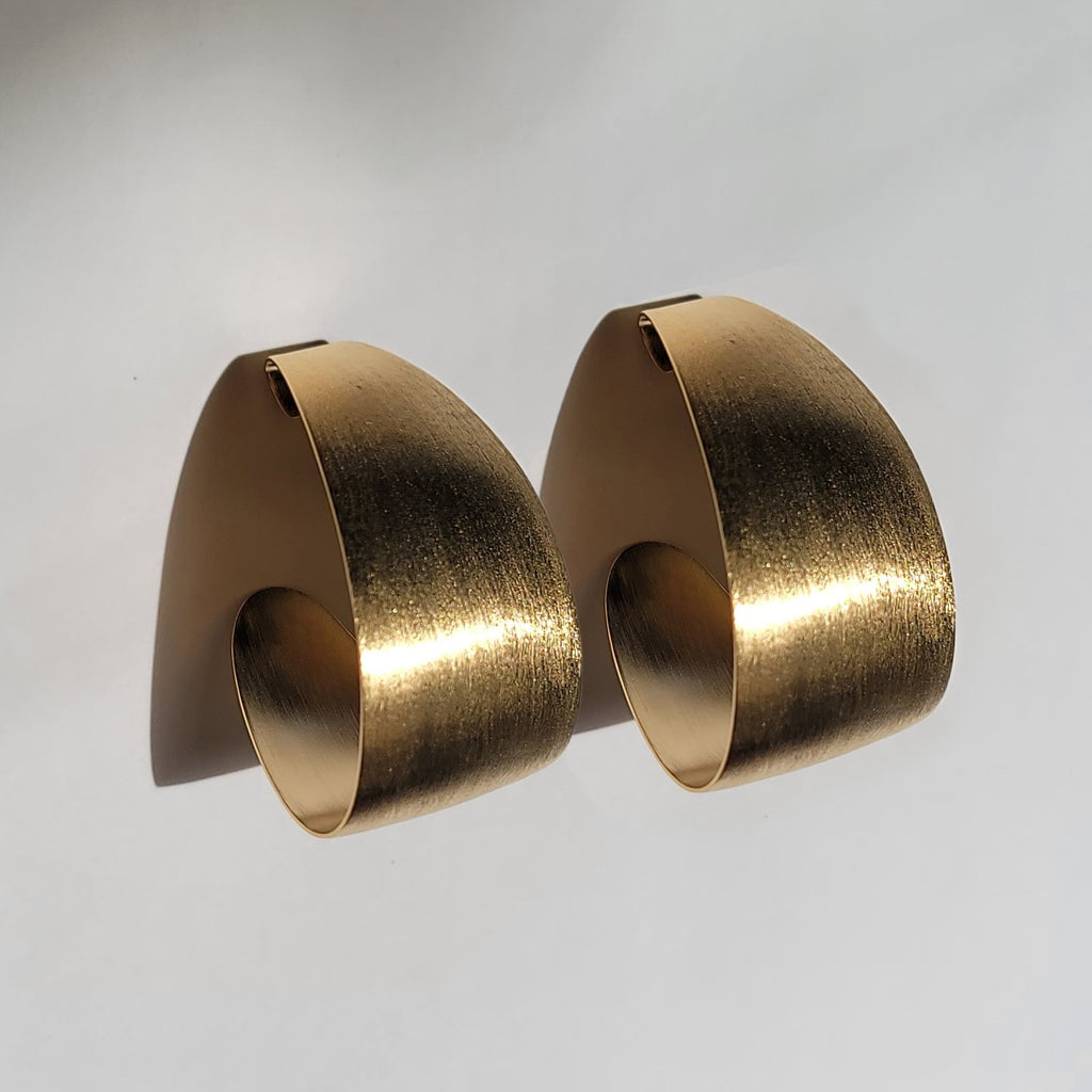 Gold petal earrings 3/4 view