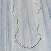14K Gold and Opal One Of A Kind Necklace on wood backdrop