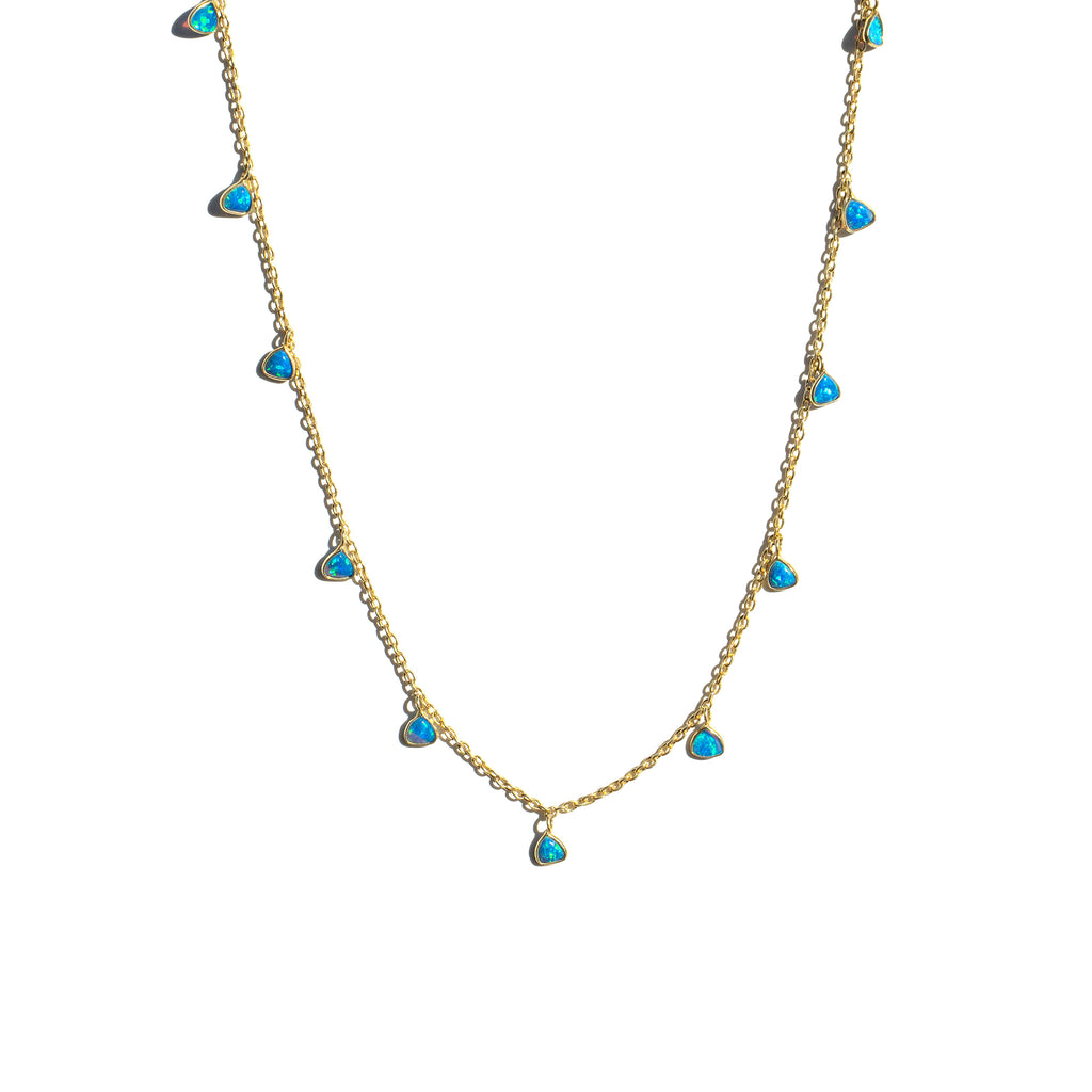 Gold chain with 11 trillium shaped Blue Opal charms