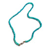 A beaded necklace made of small faceted tblue opal beads with a gold clasp, displayed on a plain white background.