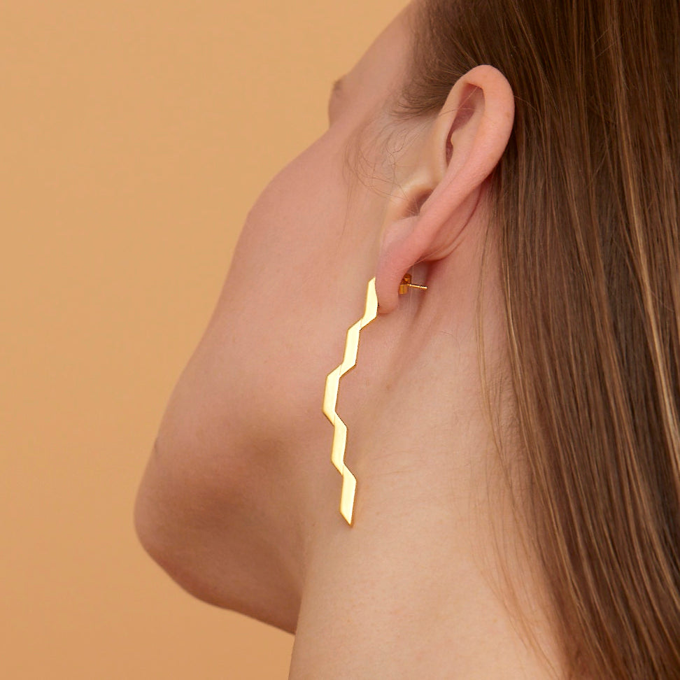 Woman wearing Solar Flare Earring