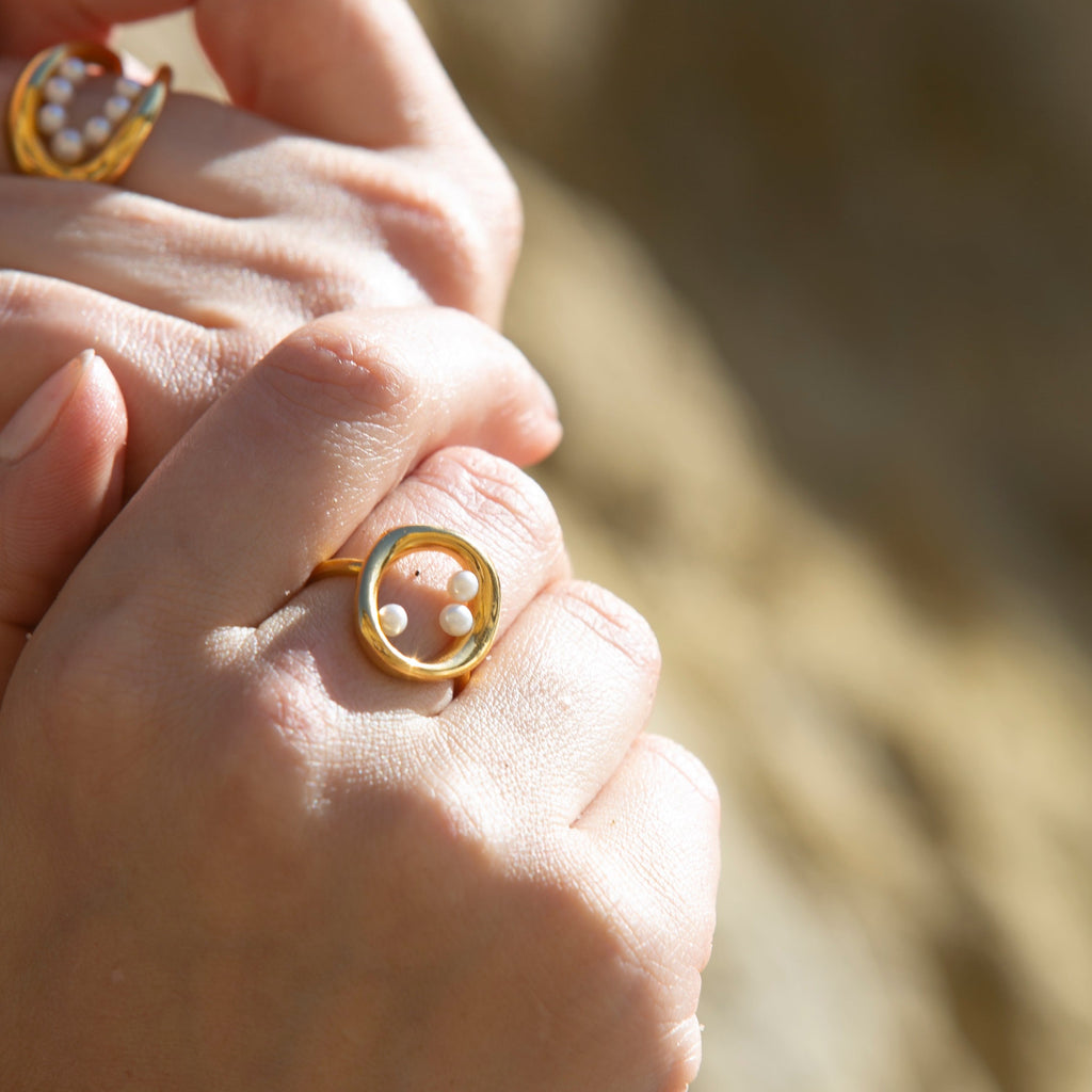 Hands wearing Naiad Ring and Selkie Ring
