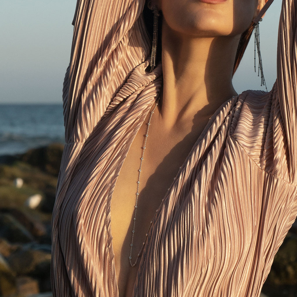 Woman wearing Silver nebula Necklace and Tassel earrings